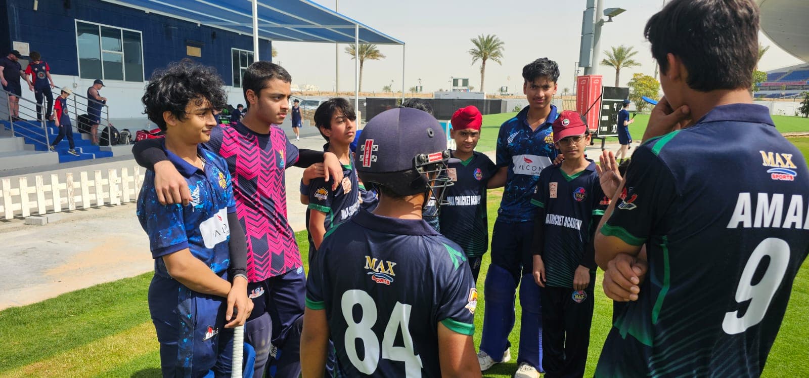 A team gathered together at a MAX Sports cricket event